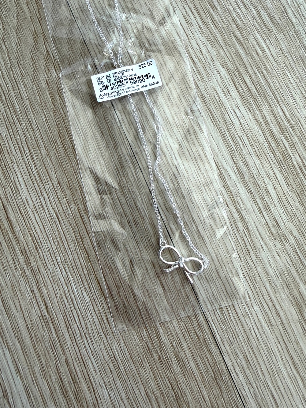Simplicity Southern Living Silver Tone Bow Charm Pendant Necklace 16 in. +Adjust